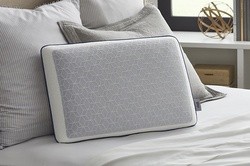 Sealy Gel Pillow on a dressed bed