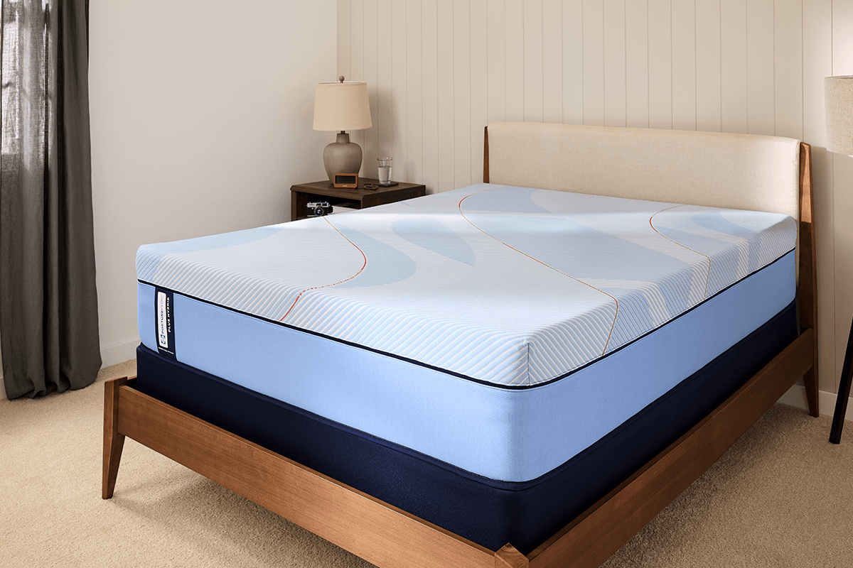naked Posturepedic hybrid mattress in a styled room
