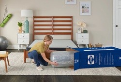 posturepedic foam mattress being unboxed