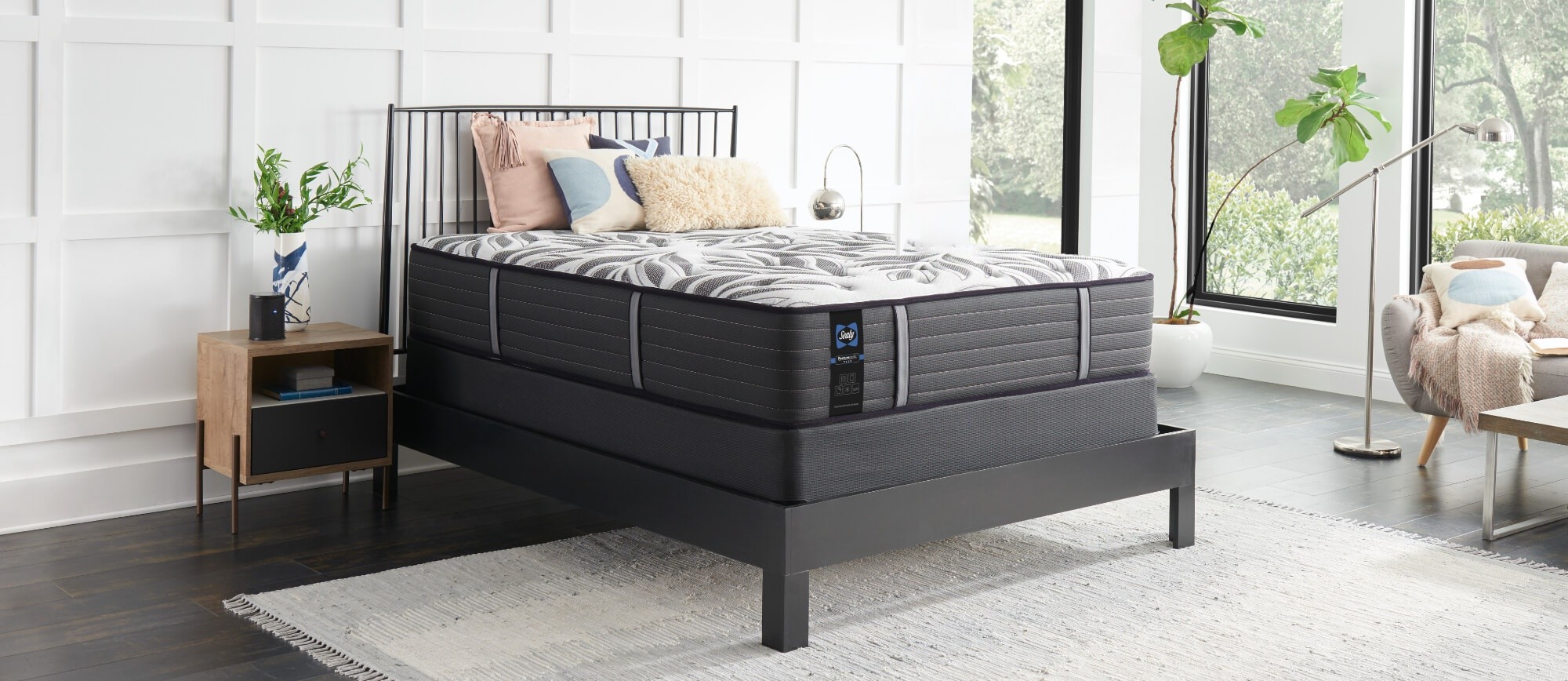 A Posturepedic Plus mattress in a styled mattress