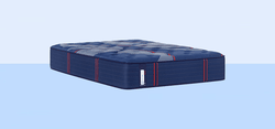 Posturepedic Elite Spring mattress with a light blue background