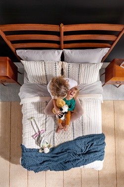 Sealy_MasterBedroom3_Lifestyle_DressedBed_TopDown