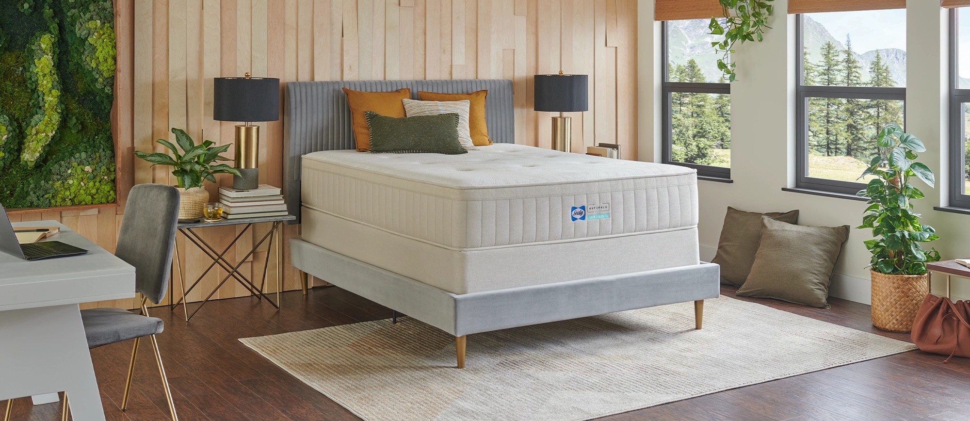 a sealy natural bed located in a styled room